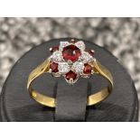 Ladies 9ct gold Garnet and CZ ring. 2.2g size P1/2