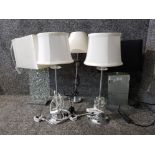 Five contemporary table lamps of various designs, including a pair.