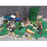 Box containing vintage Britains farm themed toys includes animals & farmers also scenery
