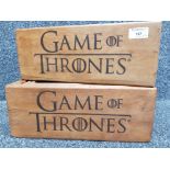 A set of two Game of Thrones wooden storage boxes comprising four graduated sizes in each set