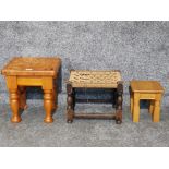 Two small pine square shaped tables and a rush seat stool.