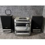 An Aiwa Hi-Fi system and a pair of matching speakers.