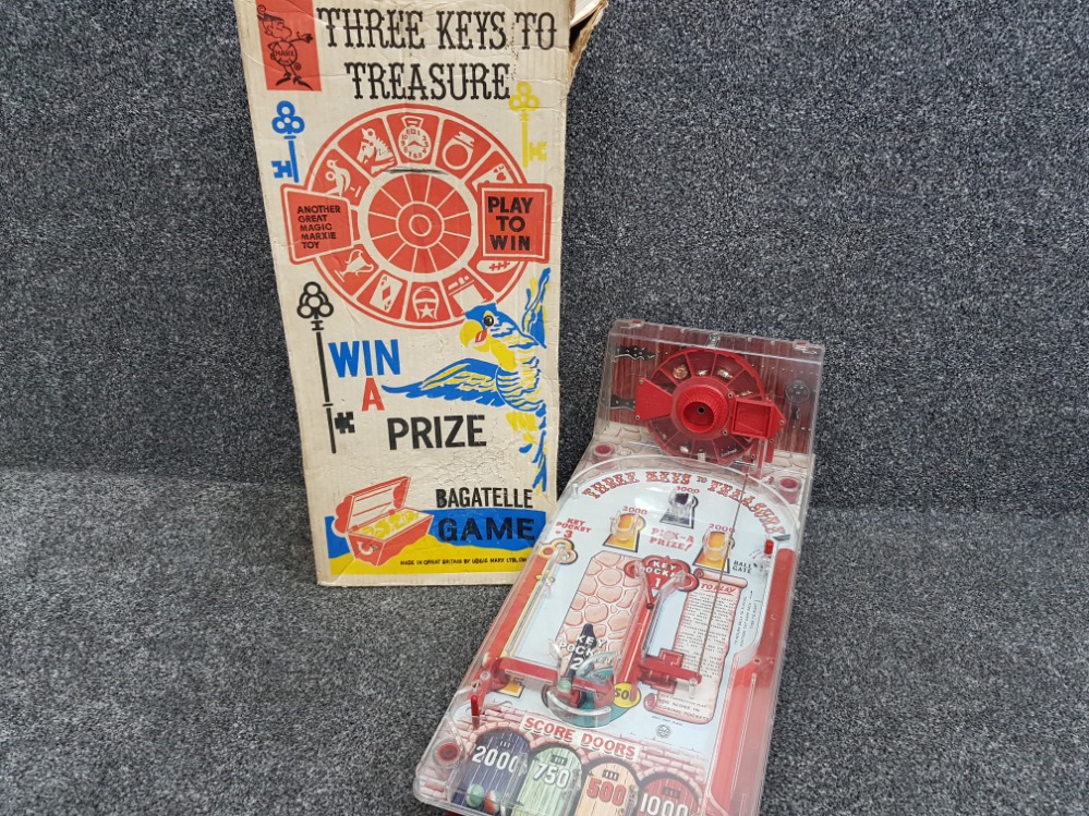 A vintage Magic Marxie toy bagatelle game, win a prize, complete with prizes & game balls, with