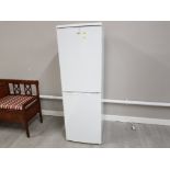 A Logik upright fridge freezer.