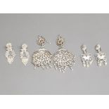 Three pairs of silver earrings of various designs, 27.6g.