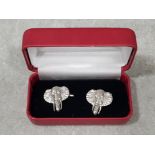 A pair of sterling silver elephant head cufflinks