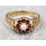 Ladies 9ct yellow gold garnet & pearl cluster ring, featuring pearl set in the centre surrounded