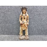 A resin figure of a Native American chief 60cm high.