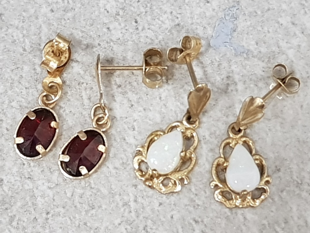 2 pairs of 9ct yellow gold drop earrings including 1 with opal drops & 1 with garnet drops, 1.4g