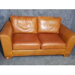 Tan leather 2 seater settee