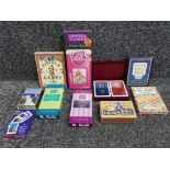 A selection of vintage playing card sets all wih original boxes