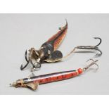 Large 8.5cm quill type body and tail spinning lure with two triple hooks and fins marked WB plus a