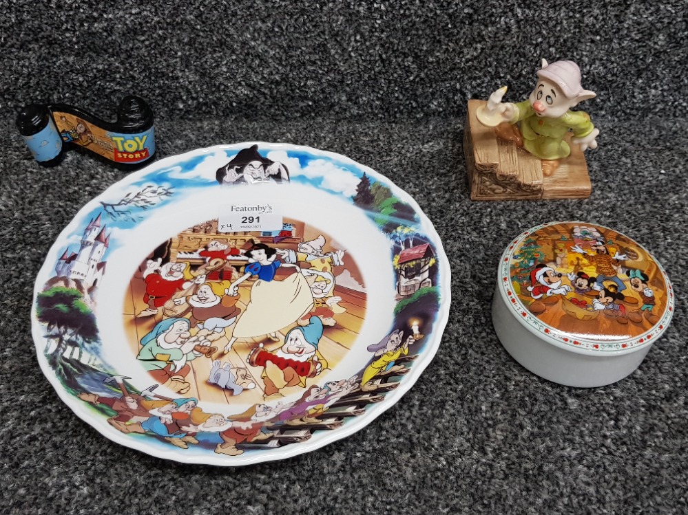 Disney items to include a snow white plate, dopey on steps, trinket and Toy Story reel.