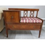 A mahogany veneer telephone table.