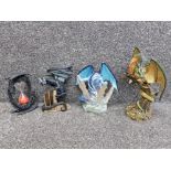 Three Land of the Dragons resin sculptures together with a sand timer with dragon decoration.