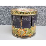 Antique circa 1920 biscuit tin designed to be used as a Zoetrope with original slides which are