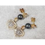 Pair of 18ct gold hematite & diamond set heart shaped drop earrings, 11.9g gross