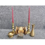 Mixed brass lot containing pair of candlesticks, canon shaped bottle holder plus other brass items