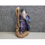 Large wizard figure painted in peacock with metallic gold trim, brand windstone editions