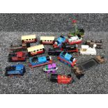 Job lot of minature train engines and carriages, Thomas the tank engine etc also includes train