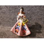An Italian pottery figure of a lady holding a vase 39cm high.
