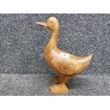 A carved wooden ornament of a wooden duck by Marks & Spencer 31cm high.