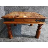 A Mexican pine square shaped occasional table with metal mounts 60.5 x 60.5cm.