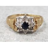 Ladies 9ct yellow gold sapphire & diamond cluster ring, featuring a black sapphire in the centre