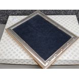 Hallmarked silver photoframe by carrs dated 2000 (millennium) together with a vintage stainless