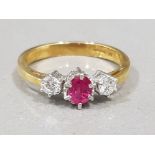 Ladies 18ct yellow gold ruby & diamond 3 stone ring, comprising of a ruby set in the centre with a