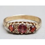 A 9ct yellow gold pink stone and diamond ring size O 1.84g.