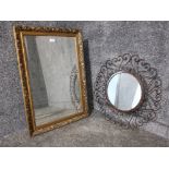 A modern bevelled wall mirror in gilt frame 77 x 53cm, and a circular wall mirror in metalwork