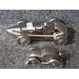 Two cast metal vintage style racing cars largest measures 25cm long.