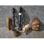 Six carved wooden Africans items to include a rhino and 1940s coconut head.