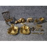 Brass items to include cat sculptures, a pair of chambersticks, shoe horn etc.