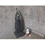 An Electrolux Airstream 1000W Hoover and a Dirt Devil handheld Hoover.