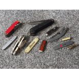A collection of pen knives and other knives.