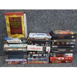 Collection of DVDs mainly box sets including the godfather, Prison break, roots etc