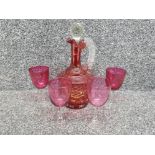 Victorian cranberry glass decanter with stopper and 4 drinking glasses