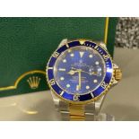 Rolex Submariner-Date, bi-metal 18ct gold with Blue dial and bezel. In good working condition with