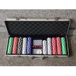 A Texas Hold'em poker set (incomplete) in metal case.