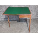 A good quality edwardian mahogany turnover top card table with green baise and dummy drawer.