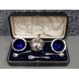 Hallmarked Birmingham silver condiment set complete with blue glass liners, with original case,