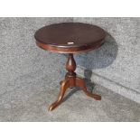 A mahogany circular tripod occasional table 59cm diameter.
