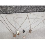 5 pendants on 5 silver chains, including mother of pearl, 2 pendants marked silver, 27.2G gross