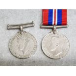 Two WW2 medals dated 1939-1945, Defence medal & army service medal