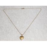 Rolled gold heart shaped locket & rolled gold chain, 3.7g