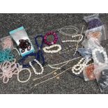 Box containing a variety of bracelets some with silver clasps