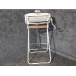 A vintage metal and wooden mangle by Acme.