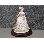 Royal Worcester figure titled "painting" one of four limited edition figures from the graceful